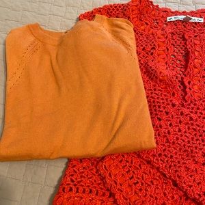 TWO sweaters!  Size L. Oranges!